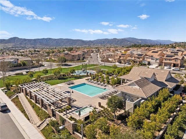 bird's eye view with a residential view and a mountain view