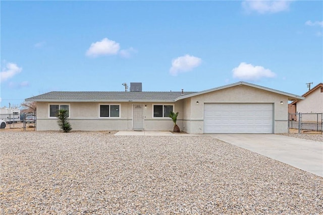 ranch-style home with a garage