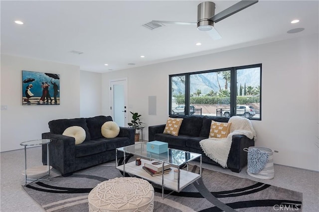 living room featuring ceiling fan