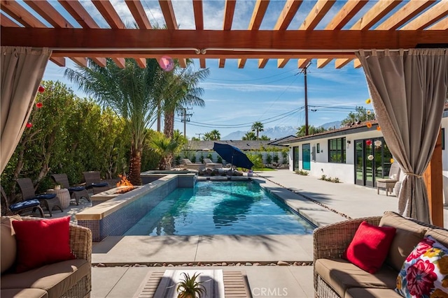 view of pool featuring an outdoor hangout area, a pergola, and a patio