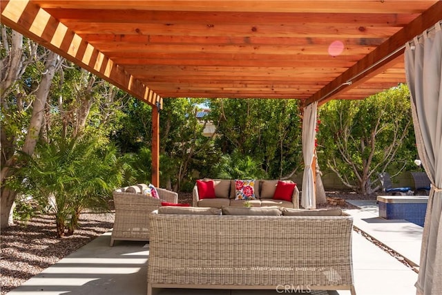 view of patio / terrace with an outdoor hangout area and a pergola