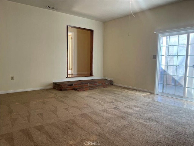 view of carpeted spare room