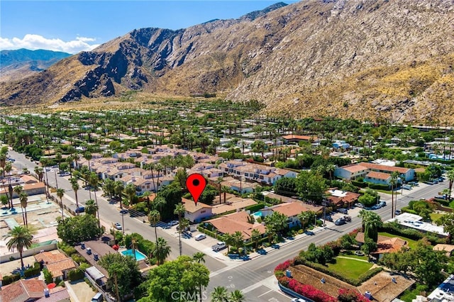 drone / aerial view featuring a mountain view