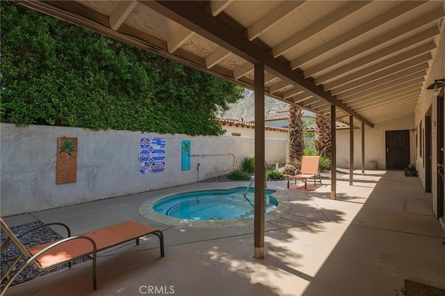 view of swimming pool featuring a patio area