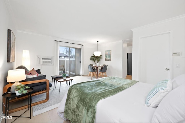 bedroom with access to outside, light wood-style floors, a wall mounted air conditioner, and crown molding