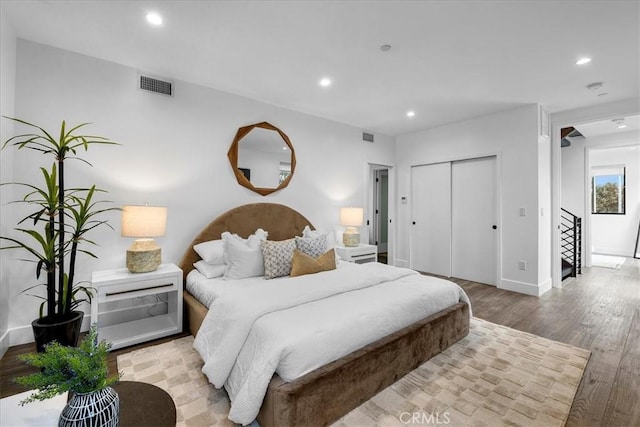 1304 N Mansfield Ave, Los Angeles, CA 90028 - bedroom with light wood-style flooring, recessed lighting, baseboards, and a closet