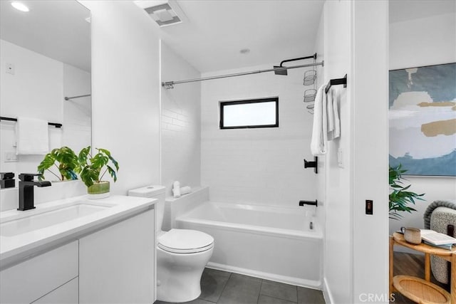 1304 N Mansfield Ave, Los Angeles, CA 90028 - bathroom with tile patterned floors, toilet, vanity, and  shower combination
