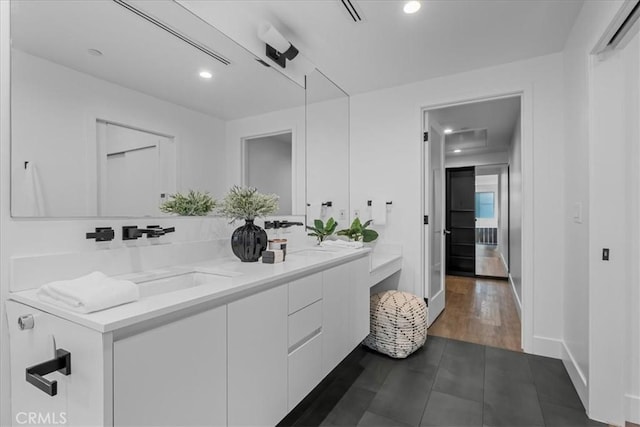 1304 N Mansfield Ave, Los Angeles, CA 90028 - full bathroom featuring double vanity and recessed lighting