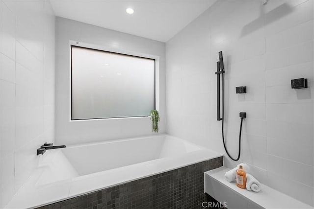 1304 N Mansfield Ave, Los Angeles, CA 90028 - bathroom featuring a garden tub and a tile shower