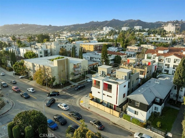 1304 N Mansfield Ave, Los Angeles, CA 90028 - drone / aerial view of a mountain backdrop
