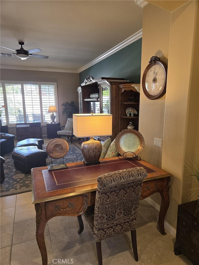 dining area featuring crown molding, ceiling fan, and light tile patterned flooring