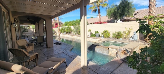 view of swimming pool with a fenced in pool, a fenced backyard, a patio area, an in ground hot tub, and a pergola