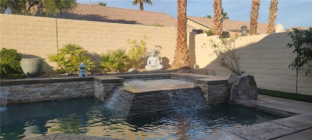 exterior space with a jacuzzi