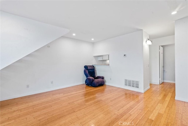 unfurnished room with light hardwood / wood-style floors