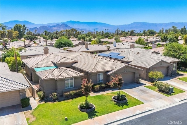 bird's eye view with a mountain view