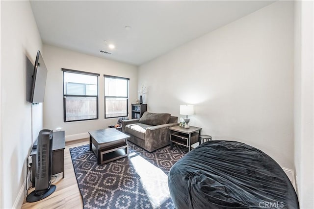 living room with light hardwood / wood-style floors