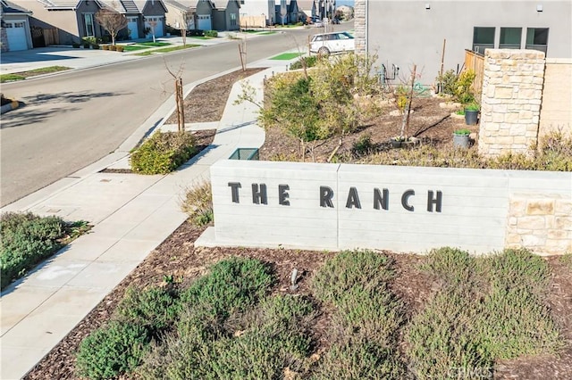 view of community sign