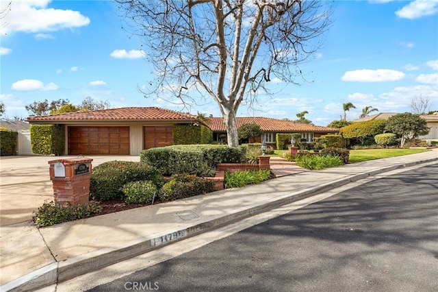 single story home with a garage