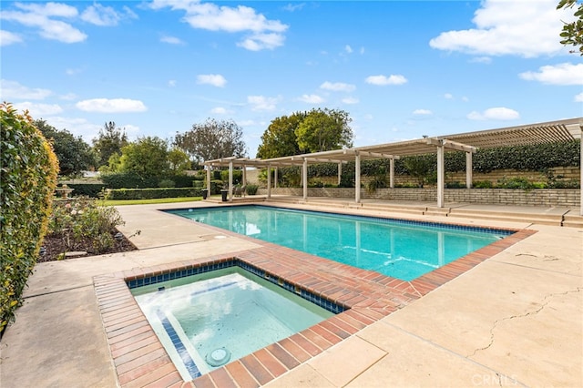 view of swimming pool with an in ground hot tub, a patio, and a pergola