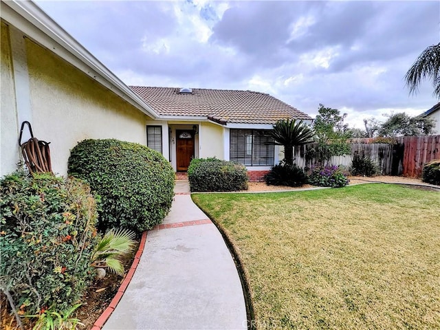 exterior space with a front yard