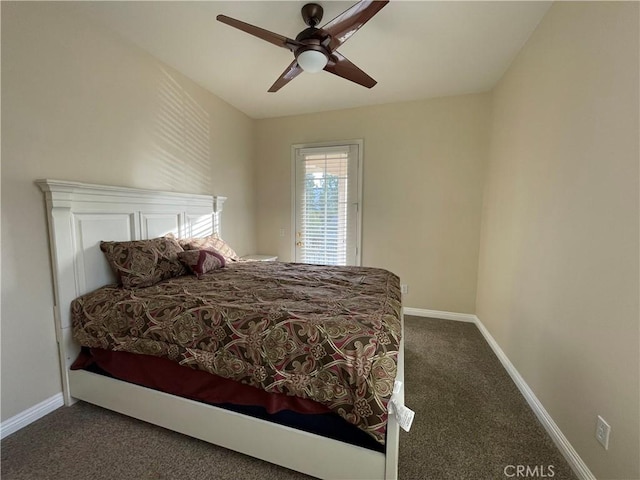 bedroom featuring ceiling fan, dark carpet, and baseboards