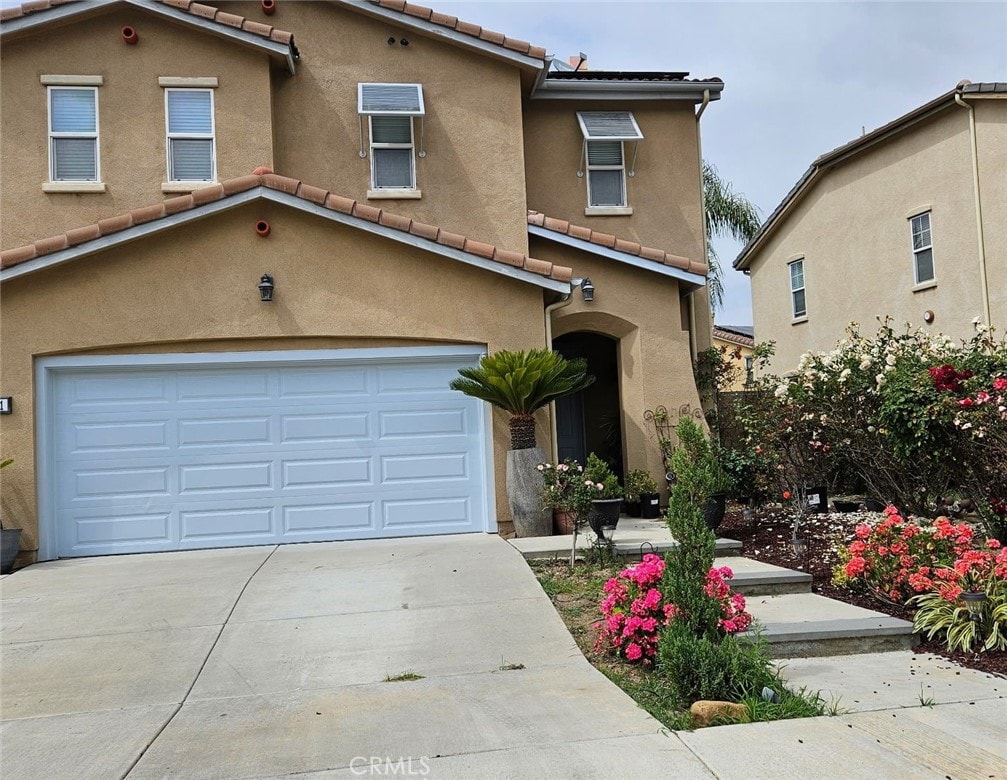 view of front of house with a garage