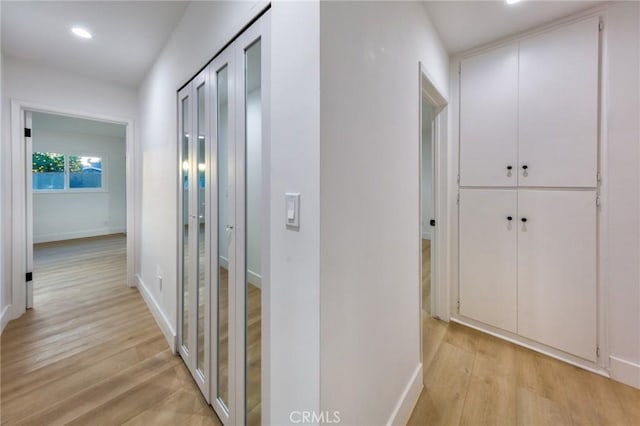 hall featuring light hardwood / wood-style flooring