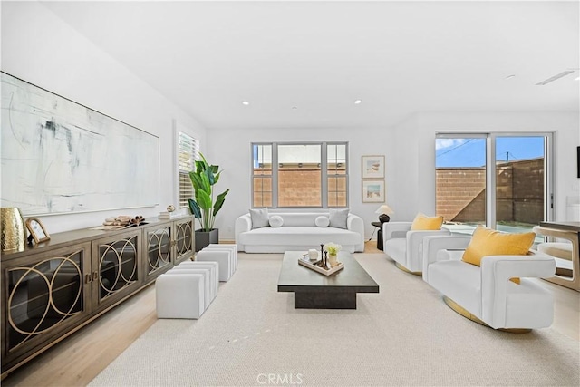 living area with recessed lighting