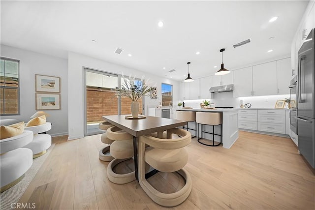 dining area featuring light hardwood / wood-style floors