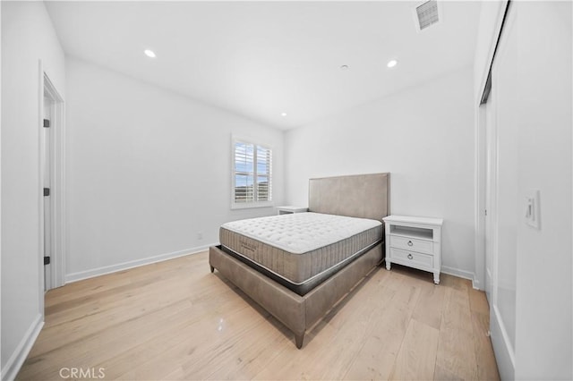 bedroom featuring light hardwood / wood-style flooring