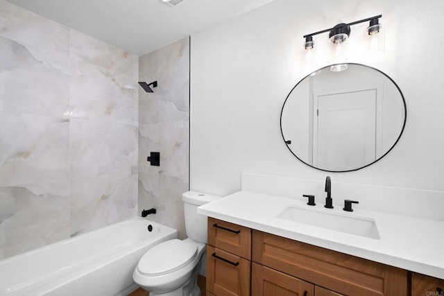 full bathroom with vanity, toilet, and tiled shower / bath combo