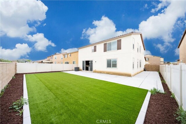 30750 Gazing Star Ln, Murrieta, CA 92563 - back of property featuring a patio, a fenced backyard, and stucco siding