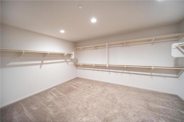 30750 Gazing Star Ln, Murrieta, CA 92563 - walk in closet featuring carpet flooring