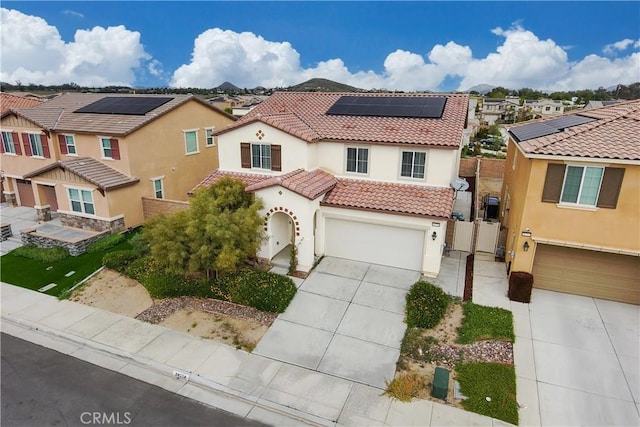 30750 Gazing Star Ln, Murrieta, CA 92563 - mediterranean / spanish home with stucco siding, a residential view, concrete driveway, and an attached garage