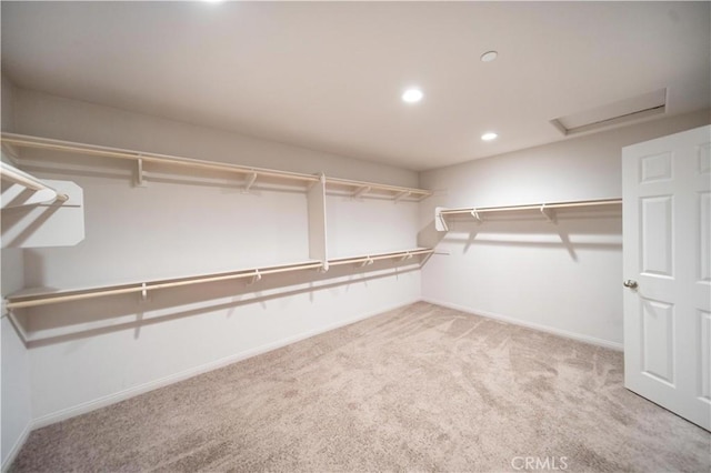 30750 Gazing Star Ln, Murrieta, CA 92563 - walk in closet featuring carpet and attic access