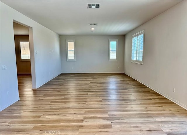 30750 Gazing Star Ln, Murrieta, CA 92563 - unfurnished room featuring plenty of natural light and light wood-style floors