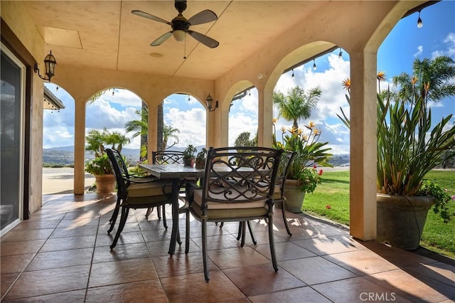 view of patio with ceiling fan