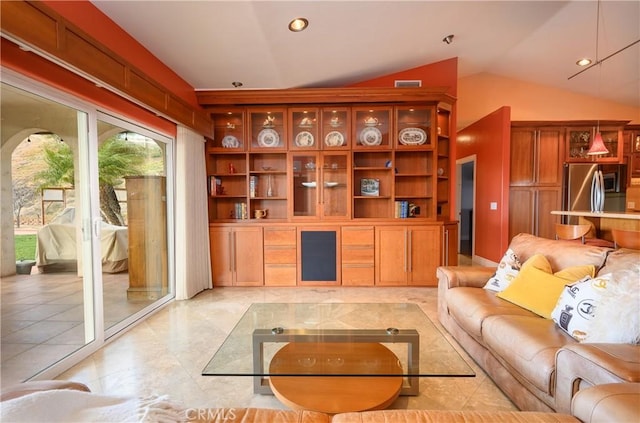 living room with lofted ceiling