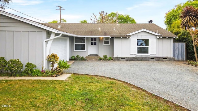 exterior space with a garage and a front yard