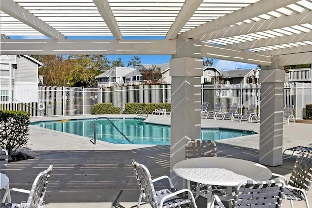 view of pool featuring a patio and a pergola