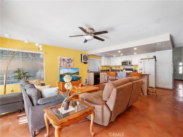 27767 Hummingbird Ln, Helendale, CA 92342 - living room featuring a ceiling fan, recessed lighting, and light colored carpet