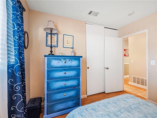 27767 Hummingbird Ln, Helendale, CA 92342 - bedroom with wood finished floors and a closet