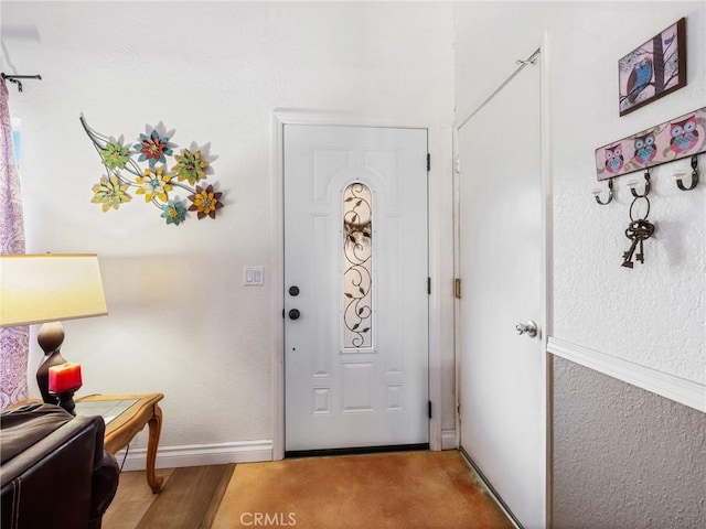 27767 Hummingbird Ln, Helendale, CA 92342 - foyer featuring baseboards and wood finished floors