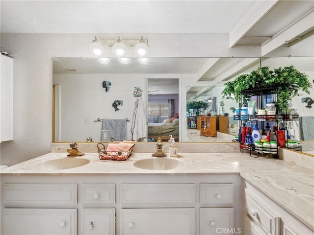 27767 Hummingbird Ln, Helendale, CA 92342 - full bathroom with ensuite bath and double vanity