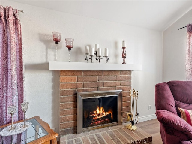27767 Hummingbird Ln, Helendale, CA 92342 - detailed view of a brick fireplace and wood finished floors