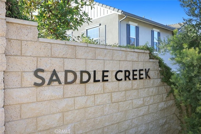 view of community sign