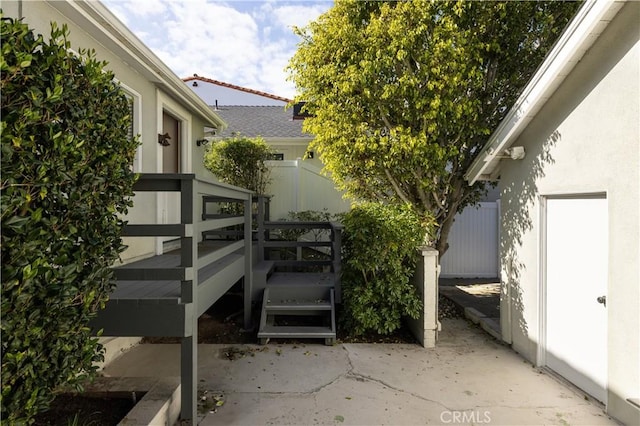 view of property exterior with a patio