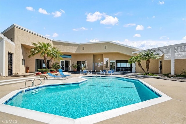 community pool featuring a patio