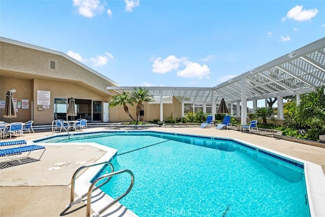 community pool featuring a patio