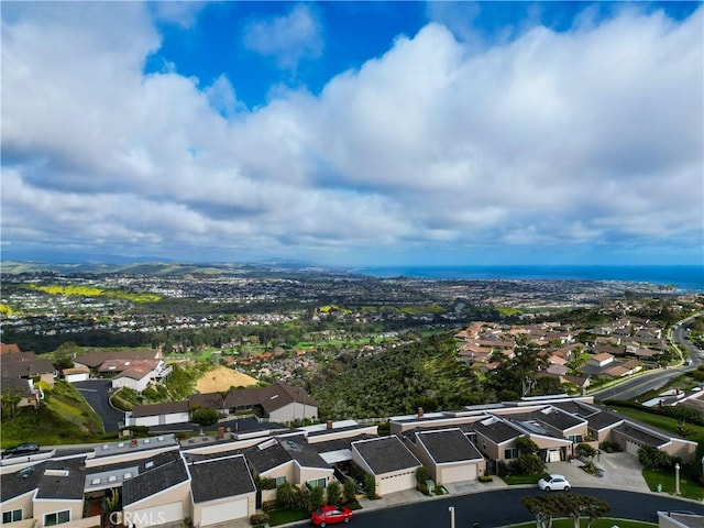 birds eye view of property with a residential view